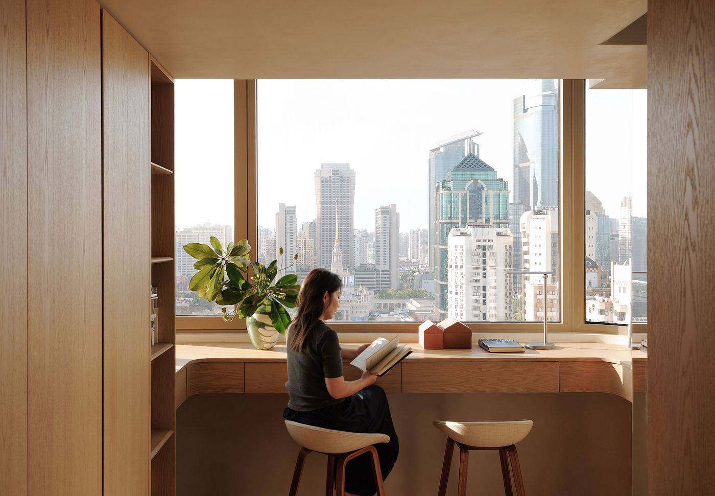 yspractice brings warmth and softness to a high-rise apartment interior ...