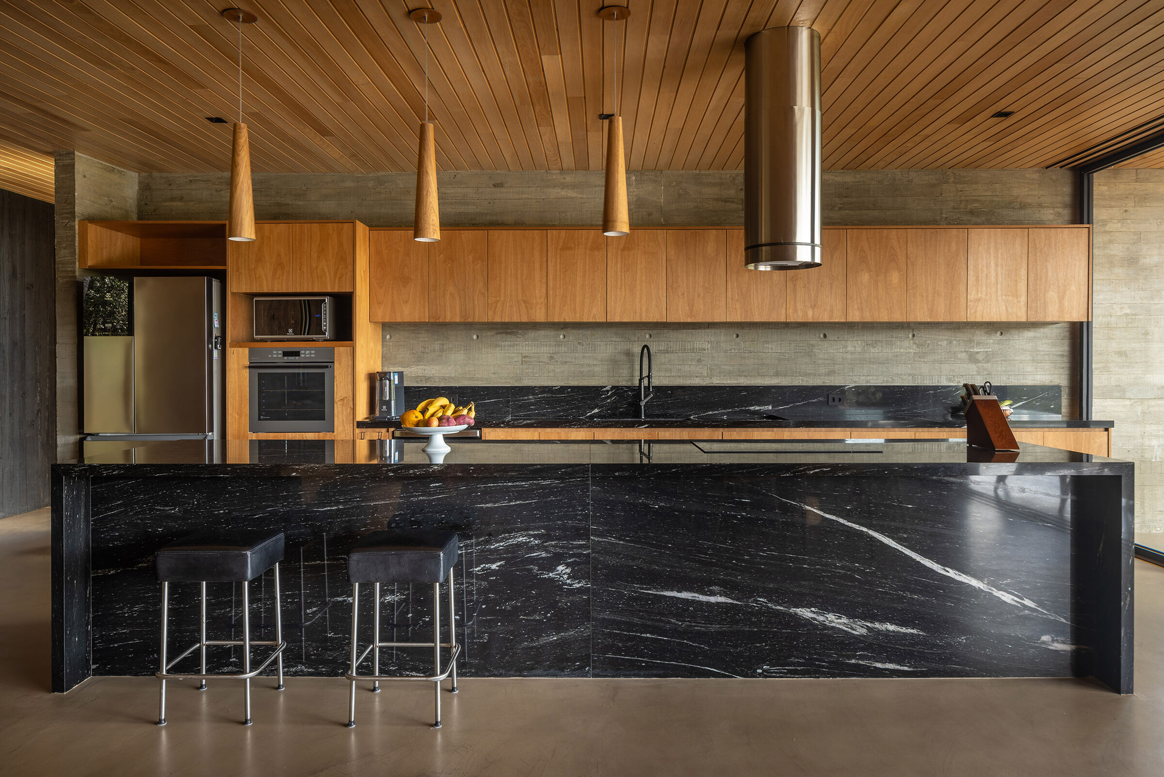 casa 258 redefines hillside living with an open-plan interior | the ...